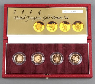 A 2004 United Kingdom Pattern Collection, 22ct 4 piece coin set, 0958/2250 78.3 grams cased with leaflet