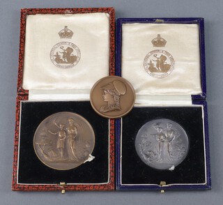 A silver commemorative medallion - Universal Cookery and Food Exhibition 1930, Birmingham 1929, 32.5 grams together with 2 bronze commemoratives