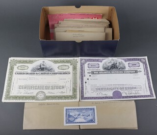 A small quantity of world bank notes and 1960 share certificates 