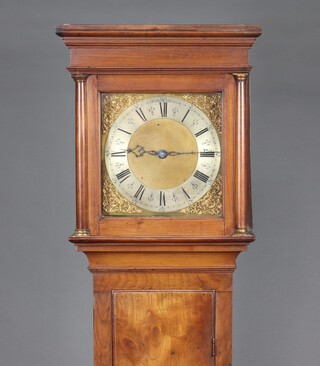 An 18th Century 30 hour striking longcase clock with 28cm later gilt dial having gilt spandrels, silvered chapter ring and Roman numerals, complete with pendulum and weight, contained in a yew case 201cm h 