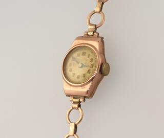 A lady's 9ct yellow gold wristwatch on a ditto bracelet 7 grams including the glass 