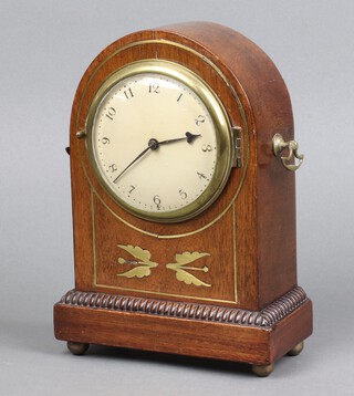 A Georgian style timepiece with 10cm circular dial contained in a mahogany and inlaid brass arch shaped case 24cm h x 17cm w x 18cm d 