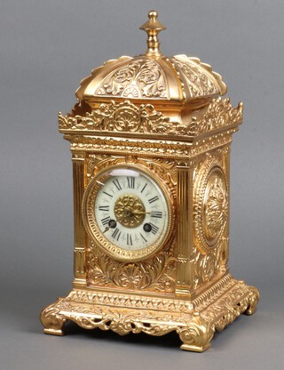 Bumbulineur, a French striking bracket clock having an 8cm porcelain dial with Roman numerals, contained in an ornate gilt case, complete with pendulum and key  35cm h x 17cm w x 17cm d 