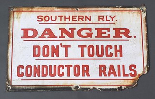 Of railway interest, a Southern Railway red and white enamelled sign "Southern Rly.  Danger.  Don't Touch  Conductor Rails." 32cm x 51cm 