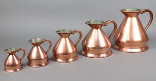 A copper gallon harvest measure together with 4 other harvest measures including a George V 1/2 gallon and 3 Victorian - quart, 1/2 pint and pint  