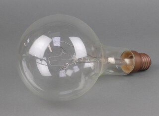 A large Phillips screw in light bulb marked 240-1500 watt 30cm x 13cm 