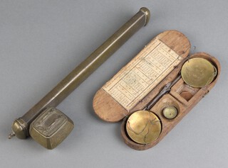 A 19th Century gilt metal Persian scribes set together with a set of 18th/19th Century steel and brass scales complete with a wooden case 