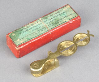 A 19th Century improved sovereign balance complete with box 