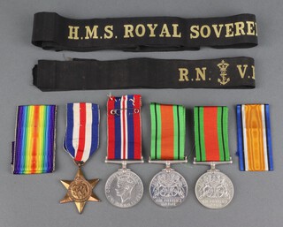 A France and Germany Star, a 1939 British War medal, 2 Defence medals, an RNVR cap tally and an HMS Royal Sovereign cap tally 