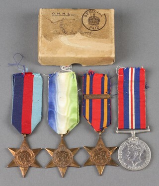 A Naval group of 4 Second World War medals comprising 1939-45 Star, Atlantic Star, Burma Star with clasp Pacific and British War medal, in posting box 