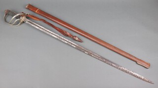 An Officer's unmarked Royal Artillery sword and scabbard with leather dress knot  