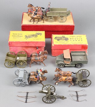 A Britains No.146 Royal Army Service Corps wagon (shaft to wagon broken), a ditto General Service Limbered wagon no.130 boxed, 2 Limbers and horses, a model 13lb field gun and a Beetle Lorry no.1877 boxed 