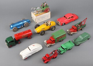 A Britains Farm "Farmers Gig" no.20F boxed, a 1930's Sun Rubber Toys model car in green, a Schuko 1070 Grand Prix racing car (no key, back left wheel missing, other's perished) and other toy cars  