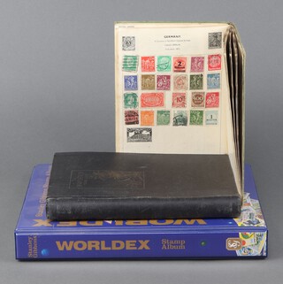 An Improved postage stamp album and various world stamps, mostly used including GB, Australia, Germany, a Wanderer stamp album of mint and used world stamps and a Stanley Gibbons album of used stamps 