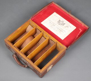 A 5 division oak and leather bound cartridge magazine, the lid with Holland and Holland label 13cm x 42cm x 30cm and with 2 fragments of GWR luggage labels to the side 