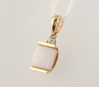 A yellow gold, testing as 14ct, square opal pendant, surmounted by a diamond 0.03ct, 18mm, 1.4 grams