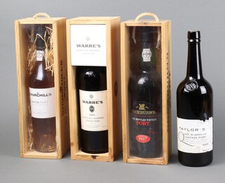 A bottle of 2001 Warre's Vintage Port, a bottle of 1988 Taylors Vintage port, a bottle of 1997 Cockburn's late bottled vintage port and a bottle of Churchill's white port 