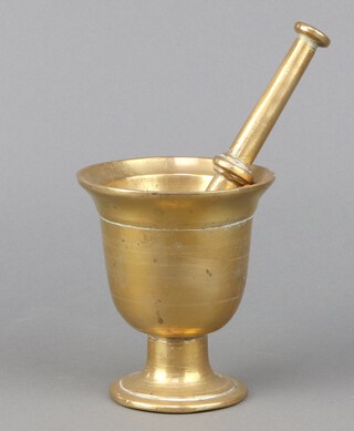 A 19th Century bell metal mortar and pestle 13cm x 11cm 