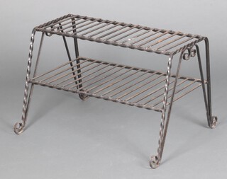 A rectangular wrought iron 2 tier boot rack/stand 48cm h x 77cm w x 57cm d 