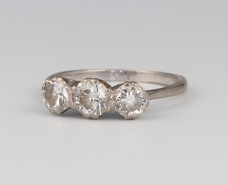 An 18ct white gold 3 stone diamond ring, approx. 1.3ct, size N, 2.9 grams 