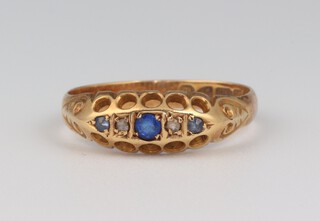 A Victorian 18ct yellow gold sapphire and diamond ring, the 3 sapphires 0.04ct, the 2 diamonds 0.01ct, size M, 2 grams