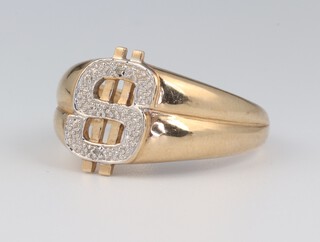 A gentleman's yellow gold, testing as 9ct, signet ring set diamonds forming a dollar sign, 5.2 grams, size Z 1/2 