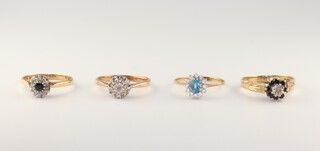 Four 9ct yellow gold gem set rings, sizes M, N, N and O, 7.4 grams 