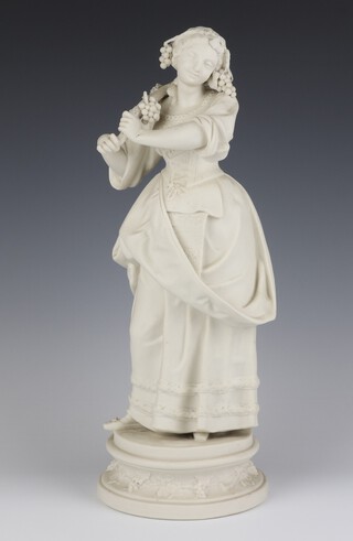 A Victorian Parian figure of a standing lady holding a vine over her shoulder on a circular base 40cm 