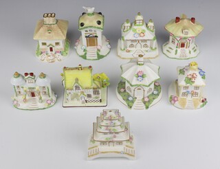 Nine modern Coalport pastel burners - The Master's House 9cm, Twin Towers 8cm, Chimney House 10cm, Thatched Cottage 10cm, Dove Cote 14cm, Park Lodge 10cm, Pagoda House 10cm, The Umbrella House 10cm and The Summer House 9cm 