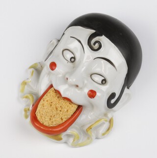 A German bisque porcelain stamp dampener of a Pierrot with sponge tongue 4114 11cm 