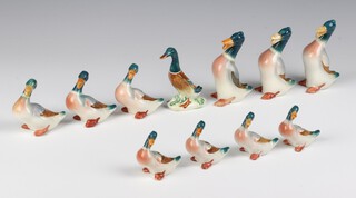 Three Beswick standing ducks 9cm, 3 seated ditto 7cm and 4 smaller ditto 6cm together with another 8cm 