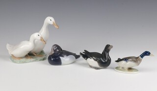 A Rosenthal duck 10cm, a Royal Copenhagen duck 1855 11cm, another 1924 10cm and 2 geese 2128 15cm 