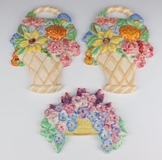 A Beswick wall plaque in the form of a basket of spring flowers 551 26cm (cracked), a ditto 26cm and another 557 16cm 