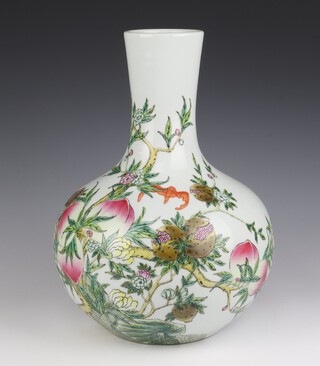 A 20th Century Chinese baluster vase with elongated neck decorated with bats amongst fruit trees with 6 character mark to base 36cm 