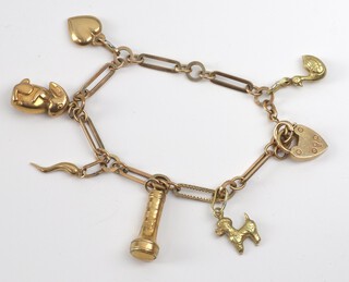 A 9ct yellow gold charm bracelet, 14.4 grams, 18cm 