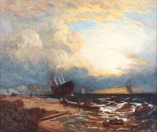 A 19th Century oil on canvas, a beached vessel with figures, signed to bottom right corner, 50cm x 60cm 