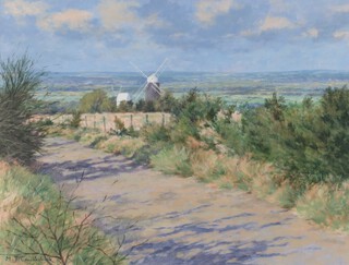 Michael J Cruickshank, British born 1957, acrylic signed, "Above Jack and Jill Mills" 42cm x 55cm 