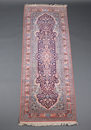 A pink and blue ground Persian silk runner 214cm x 80cm 