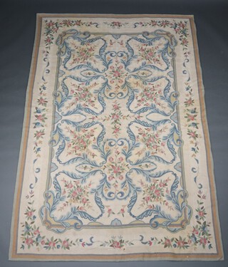 A white and floral patterned Aubusson style rug 268cm x 177cm 