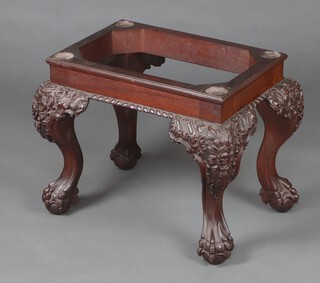 A 1920's rectangular carved mahogany Georgian style cabinet base, raised on heavily carved cabriole, ball and claw supports 42cm h x 55cm w x 40cm d 