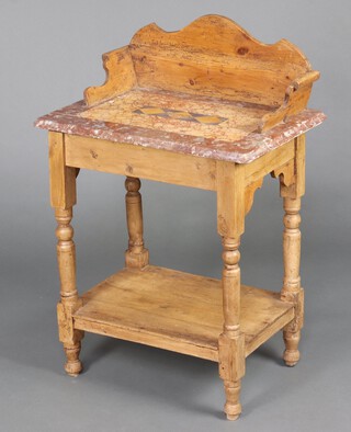 A Victorian pine and marble topped 2 tier wash stand with three-quarter gallery, the base raised on turned supports with undertier 92cm h x 62cm w x 44cm d 