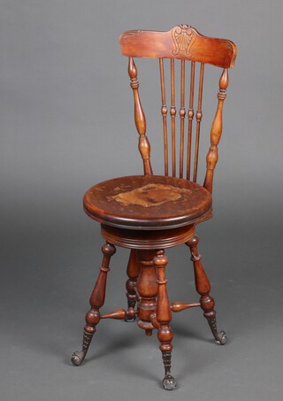 A Victorian Continental mahogany stick and rail back harpist's stool, on turned supports with metal and glass ball and claw supports 91cm h x 36cm diam. 