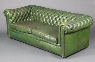 A 2 seat Chesterfield sofa upholstered in green buttoned leather 67cm h x 184 cm w x 81cm d (seat 132cm x 42cm d) 