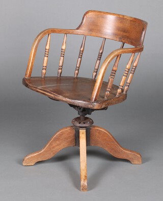 An Edwardian elm office chair with spindle decoration 77cm h x 55cm w x 46cm d (seat 30cm x 30cm) 