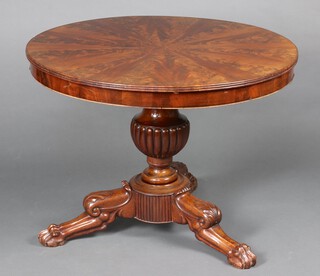 A 19th Century circular Continental figured walnut pedestal table, raised on a bulbous turned support with tripod base 70cm h x 96cm 