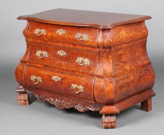 A 20th Century Dutch figured walnut serpentine fronted bombe commode of 3 drawers 68cm h x 87cm w x 49cm d 