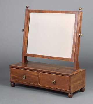 A 19th Century rectangular plate dressing table mirror contained in an inlaid mahogany frame, the crossbanded base fitted 2 short drawers, raised on turned supports 57cm h x 50cm w x 19cm d 