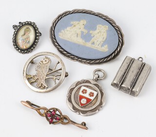 A silver mounted Wedgwood brooch and 3 other brooches, a fob and pendant 74 grams 