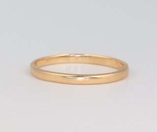 An 18ct yellow gold wedding band, 1.6 grams, size L 