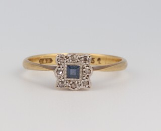 An 18ct yellow gold sapphire 0.03ct and diamond 0.08ct ring, size R, 2.3 grams 